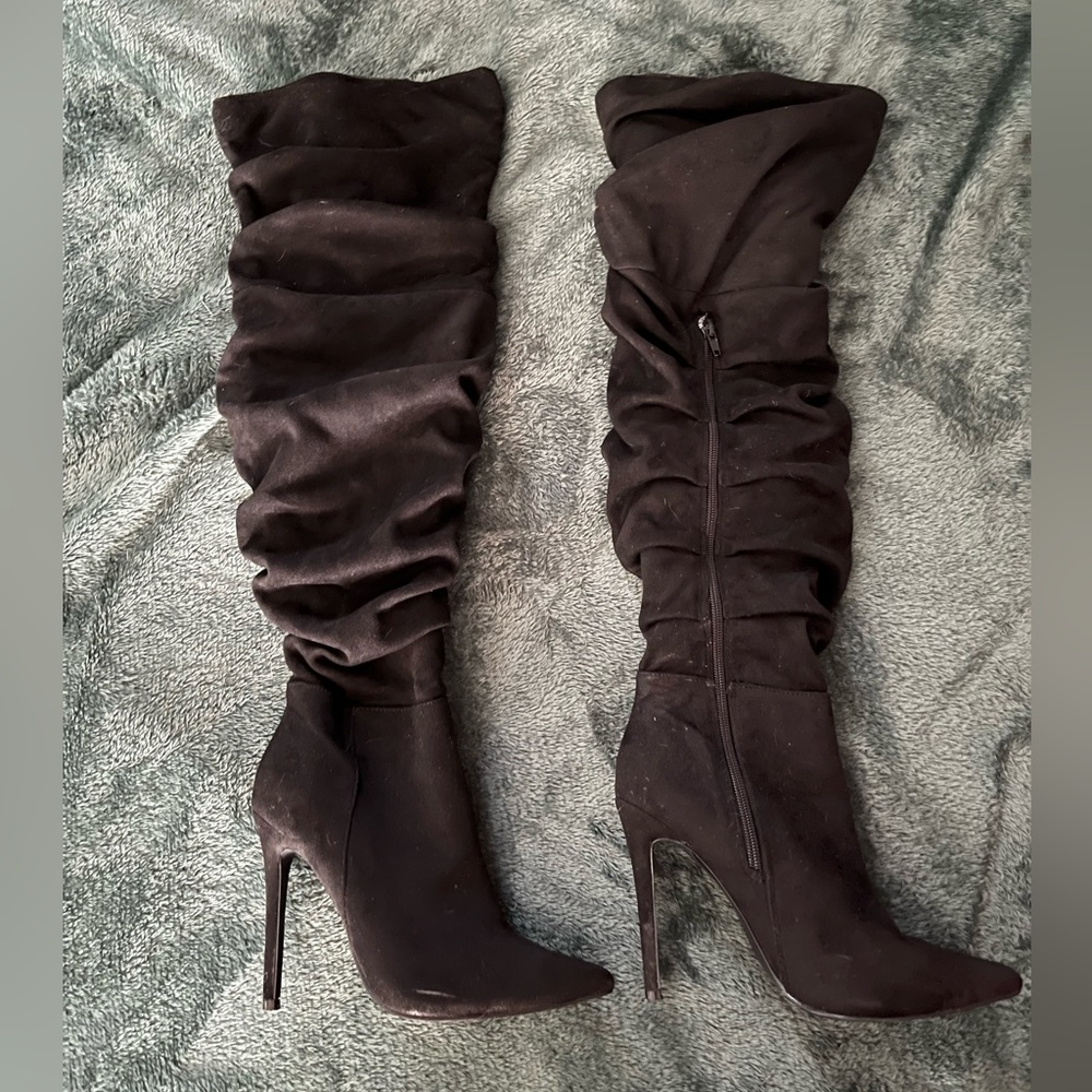 Thigh high heeled boots